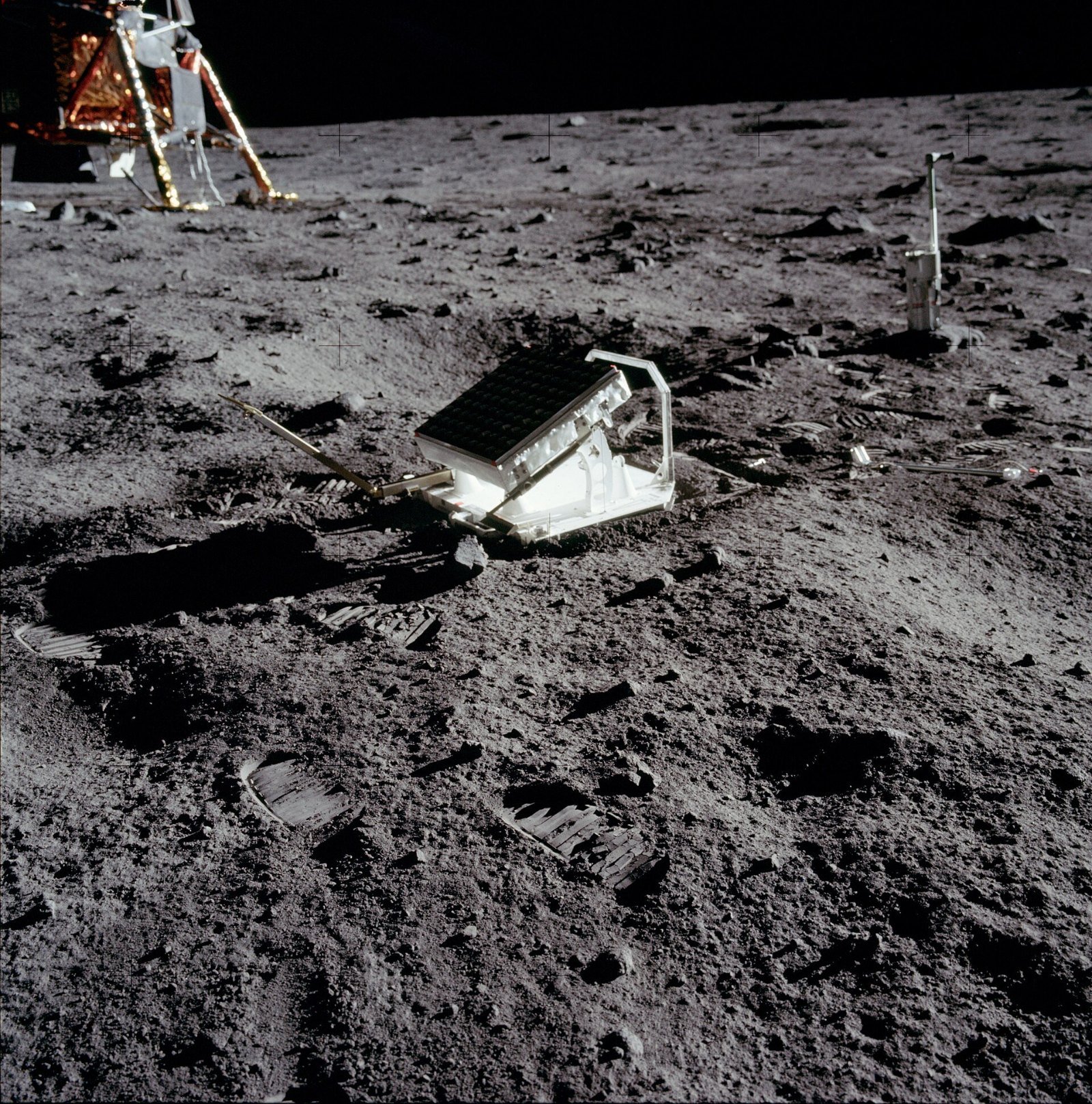 Laser Ranging Retroreflector panel of glass prisms sitting on the lunar soil at Tranquility Base